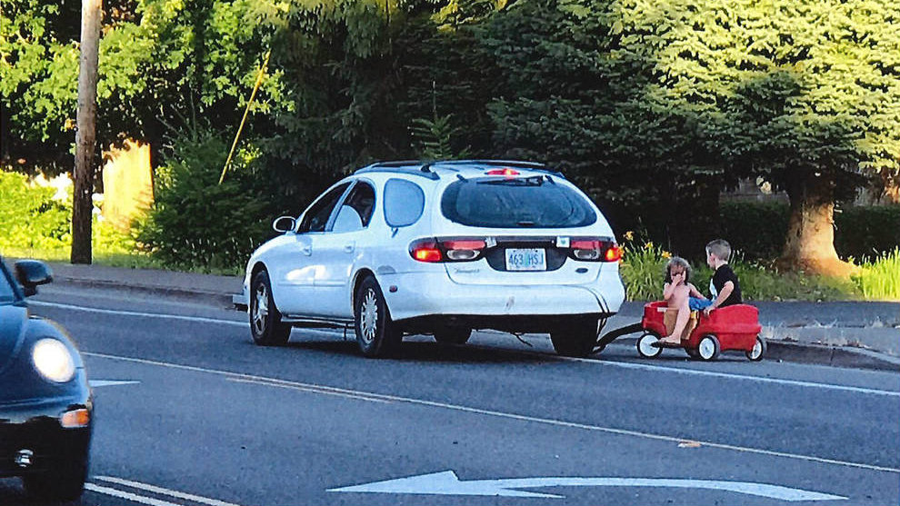 Mom who towed kids in wagon behind car pleads guilty Mom who towed kids in wagon behind car pleads guilty